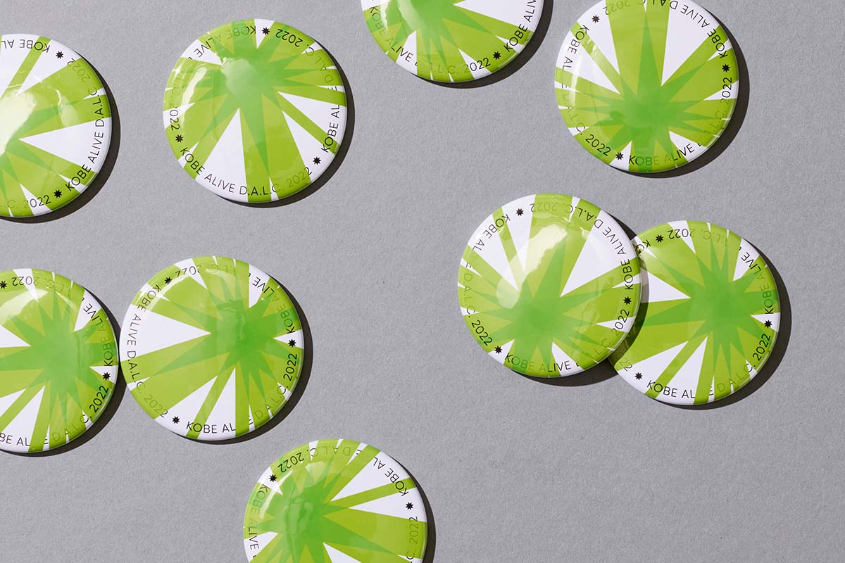 イベントのノベルティ｜緑色の缶バッジ